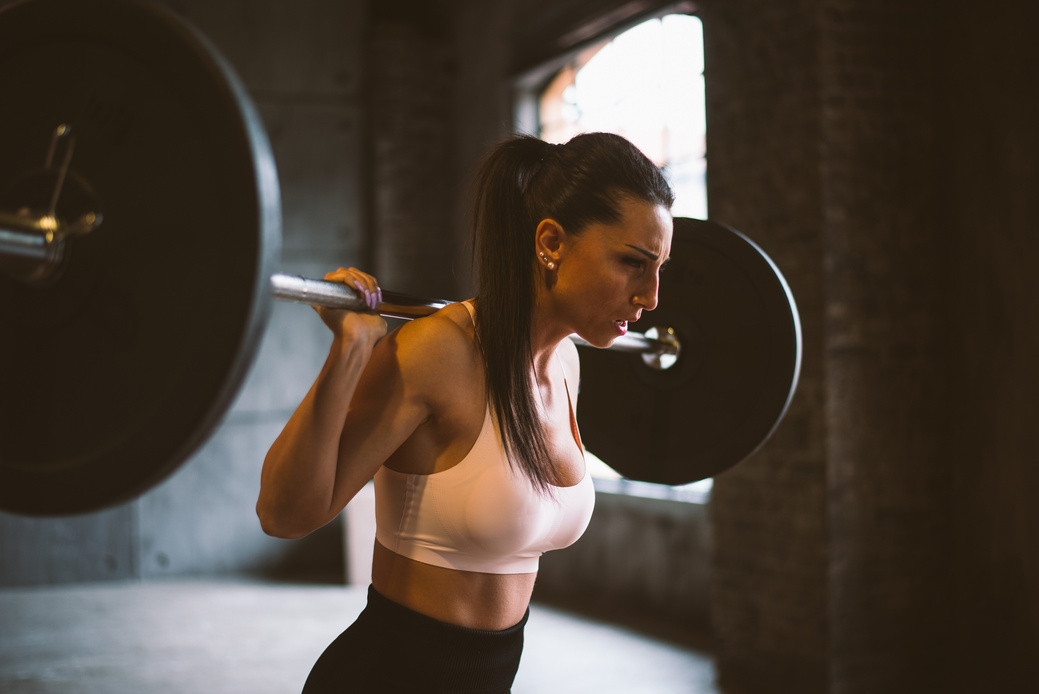 female bodybuilder training at the gym
